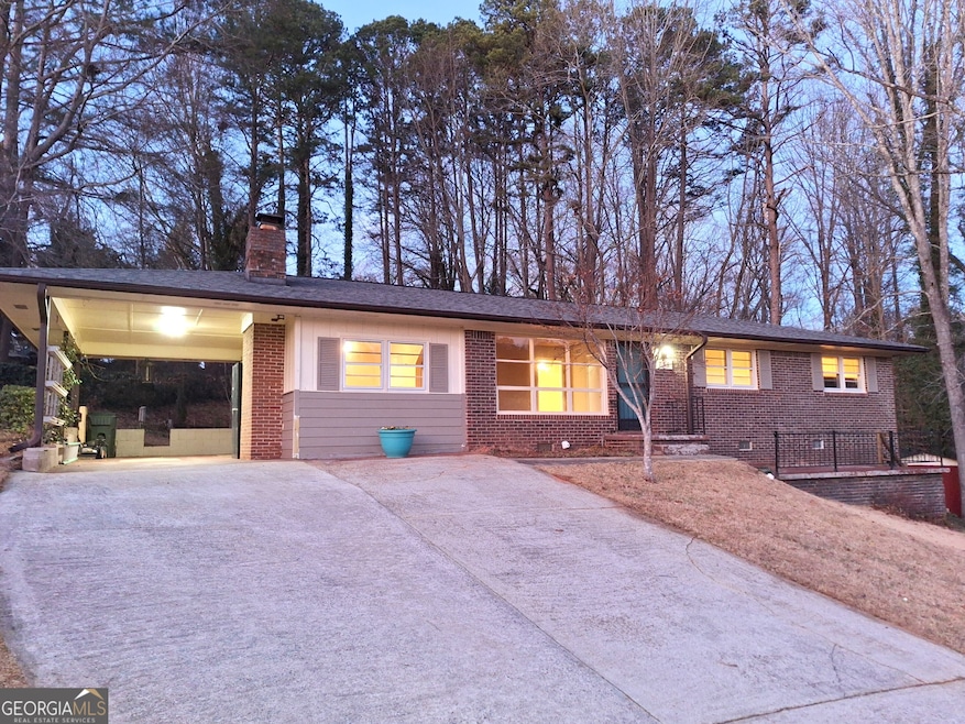 Ranch-style house with a carport