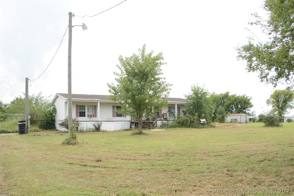 1122 W Main St, Beggs, OK 74421 - photo 1