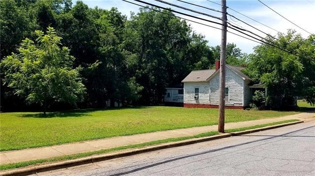 1128 N Ashe Ave Parcel with Frame Dwelling (AS IS,