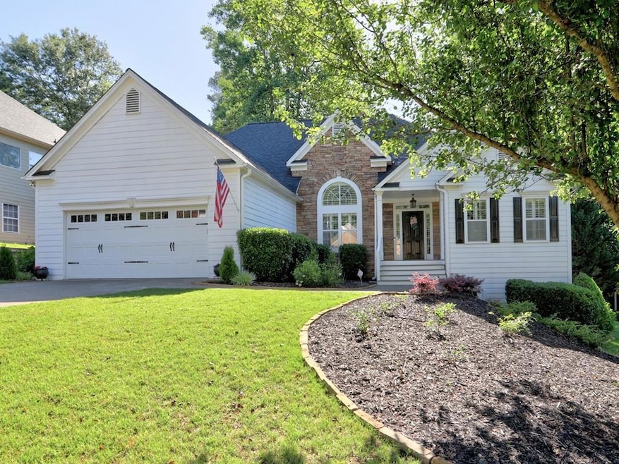View of front of house featuring a garage and a fr