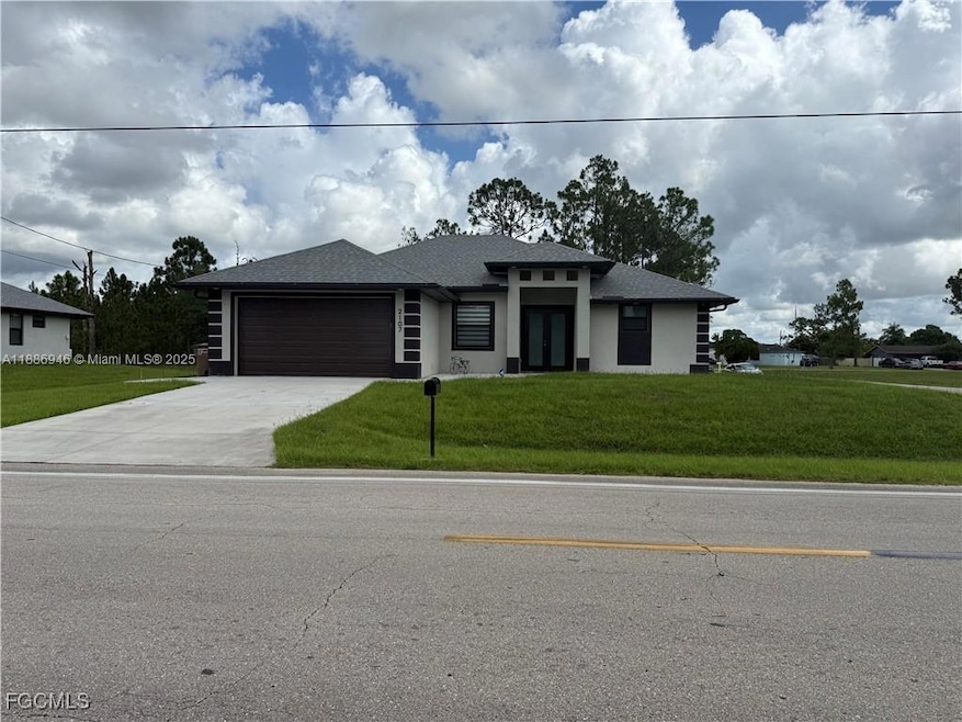 2107 E 10th St, Lehigh Acres, FL 33936 - photo 1
