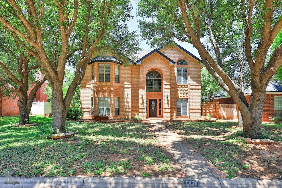 View of front of house with a front yard