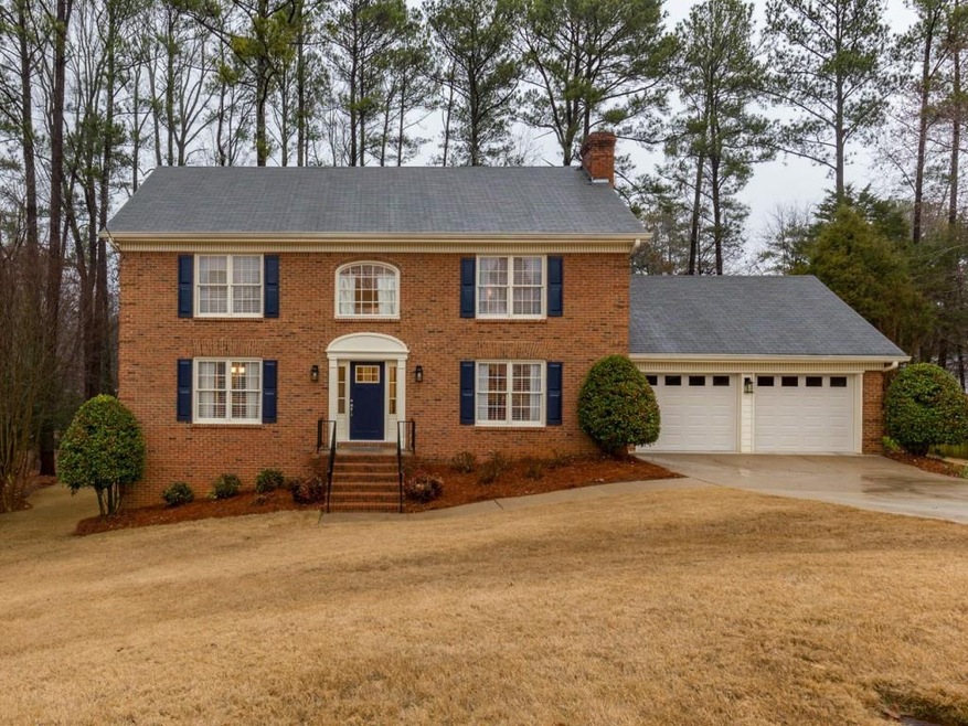 Welcome Home!  This three sided brick home is loca