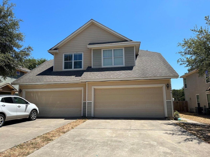 View of front of house featuring concrete drivewa