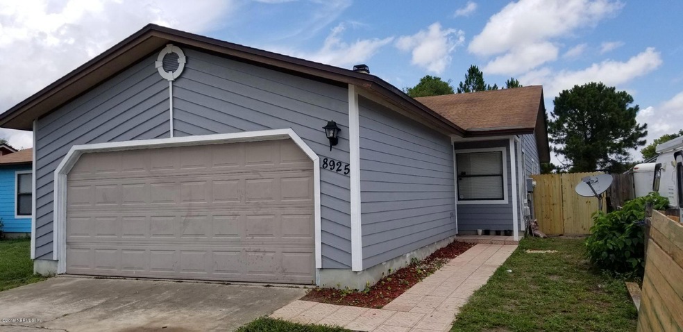 8925 Ivey Rd, Jacksonville, FL 32216 - photo 1