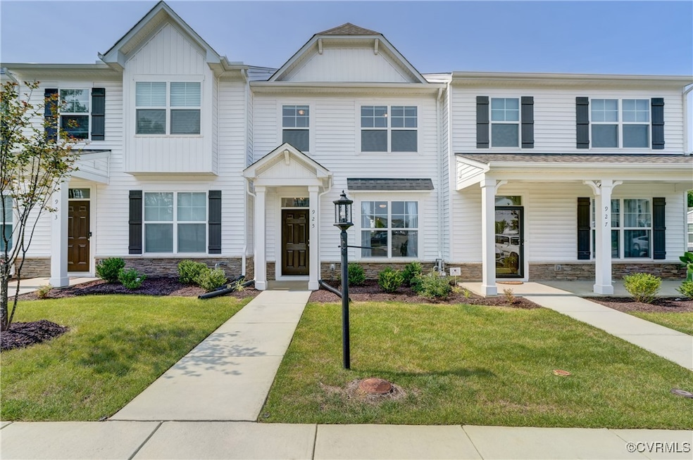 Multi unit property featuring stone siding and a f