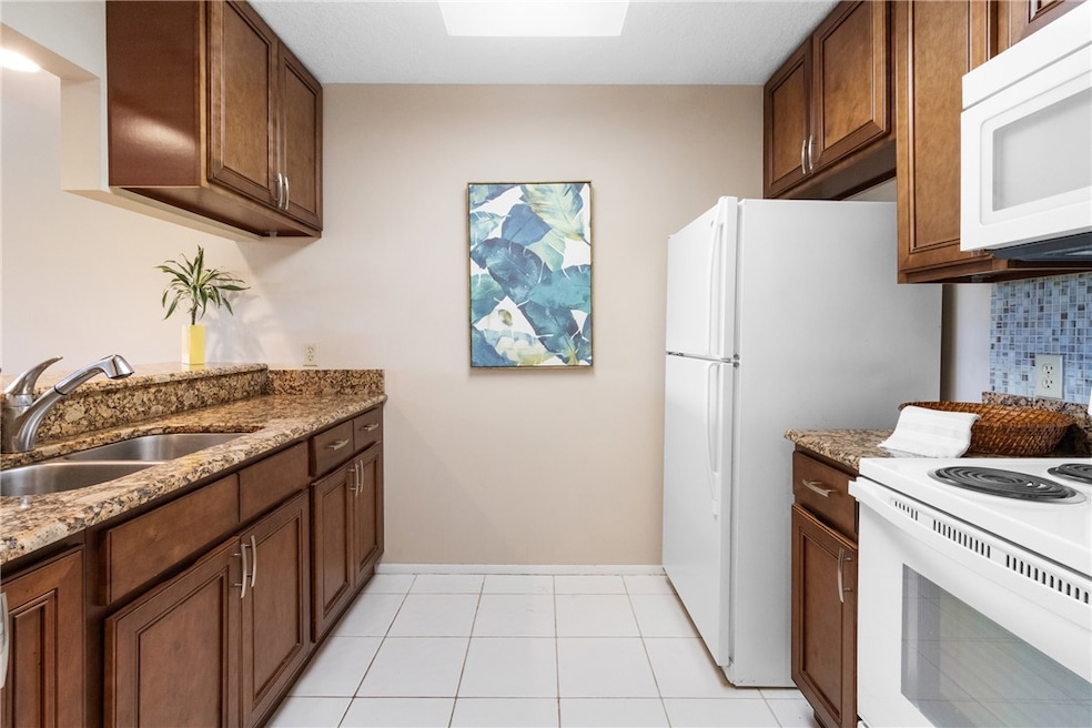 Beautiful kitchen featuring granite countertops
