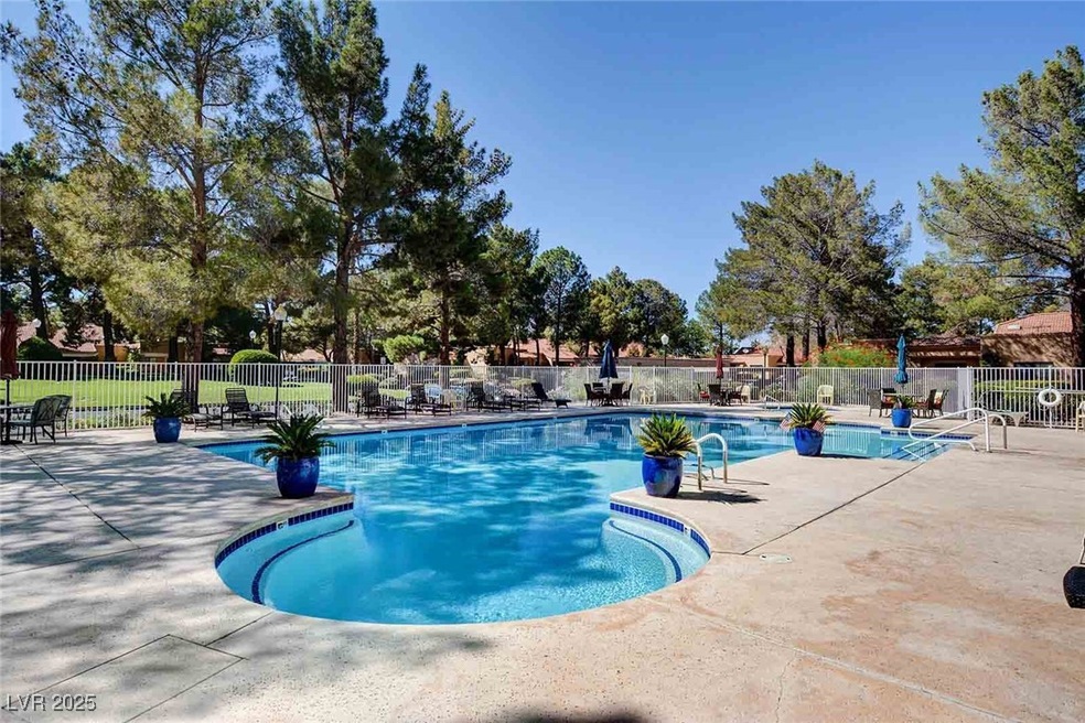 Community pool with a patio area