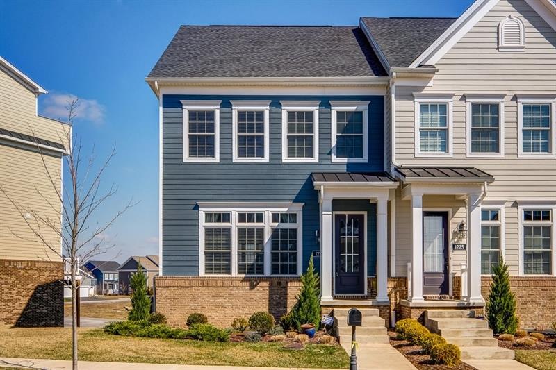 Welcome home.  Charming covered front stoop with s