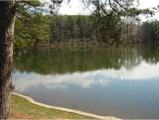 Exterior Back. Come live on the Lake!! View from y