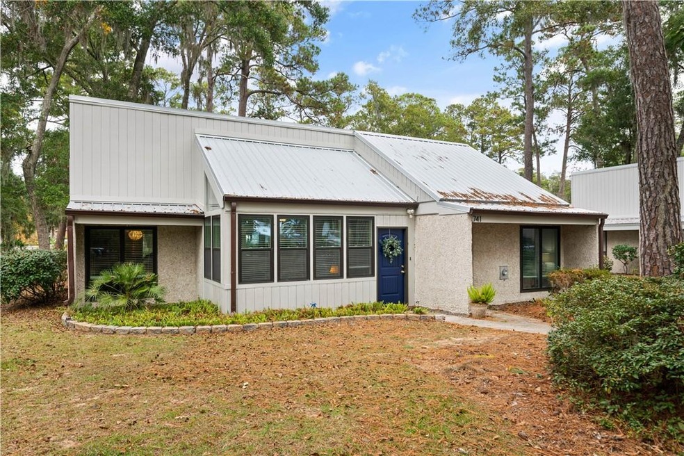 New metal roof and recently painted exterior.