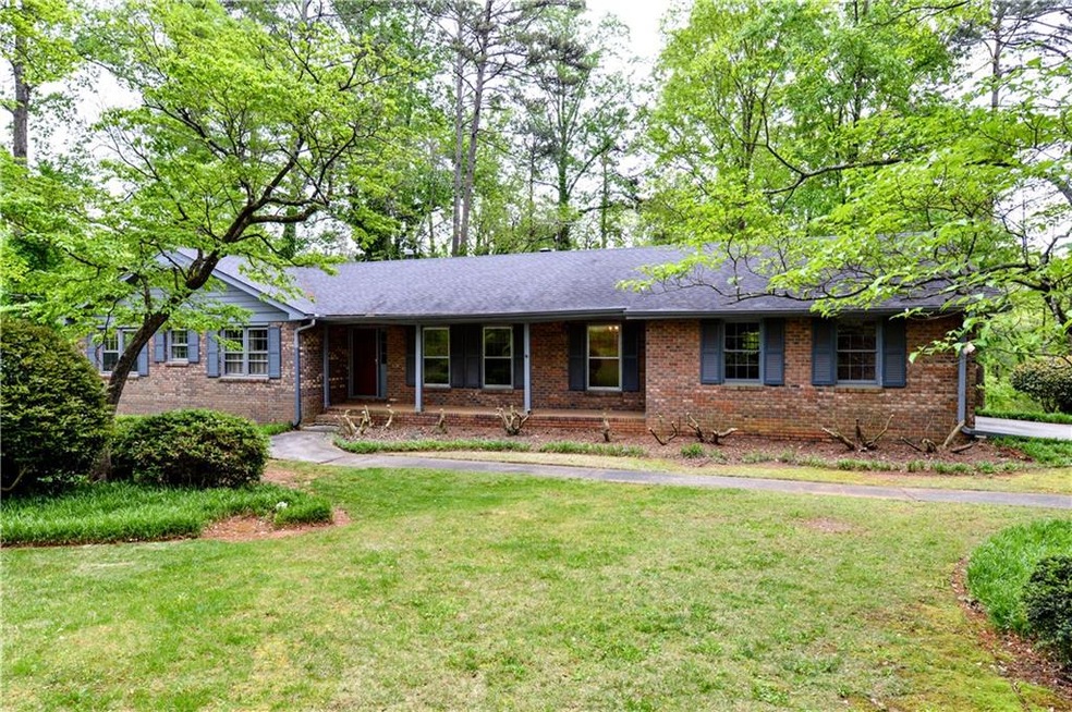 CHARMING BRICK RANCH WITH FOUR BEDROOMS