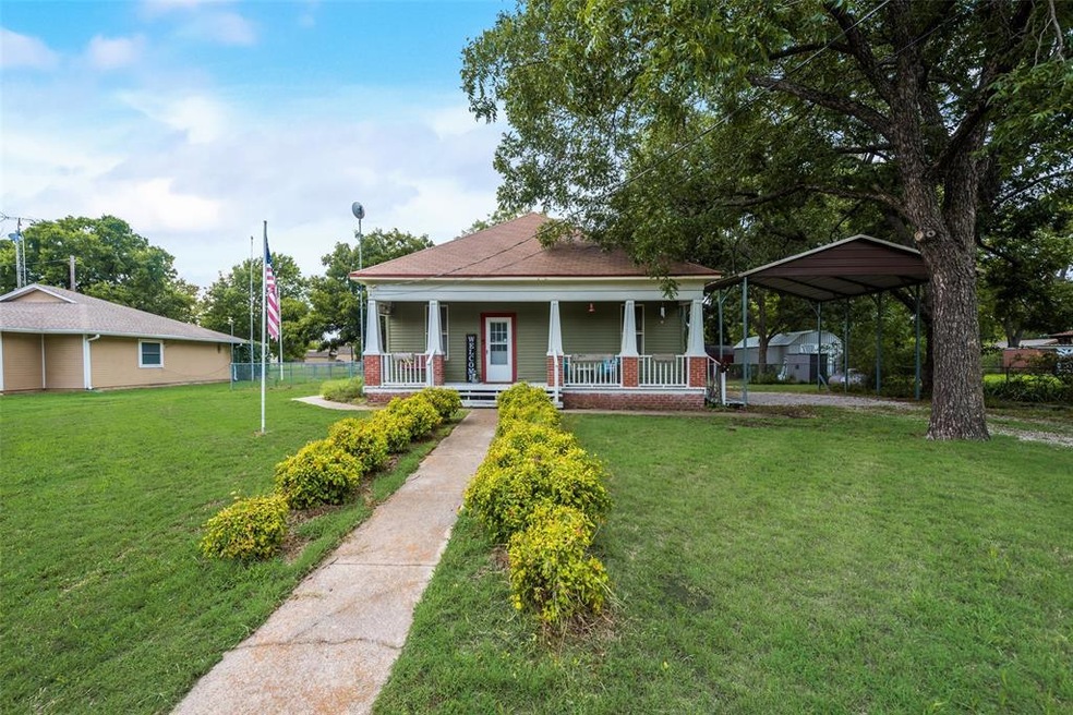 What a cute home. Welcome to the front porch!