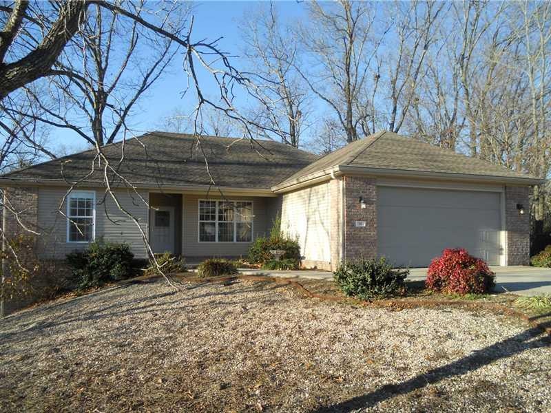 Exterior Front. Low maintenance exterior & rock yard mean more time on the golf course or fishing, less with chores!