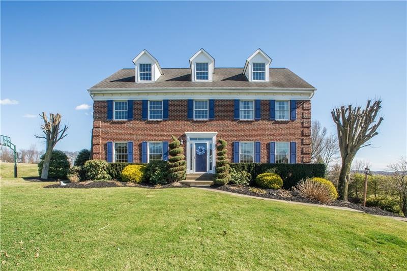 This stunning spacious brick Colonial built-by McC
