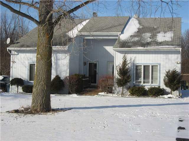 Exterior Front. Unit for sale is on the right side