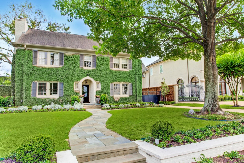 This delightful home showcases an impressive curb appeal as the property boasts mature oak trees & sophisticated landscaping with a charming private stone walkway. The spacious lot allows for an extensive driveway & plenty of space for front yard entertainment.