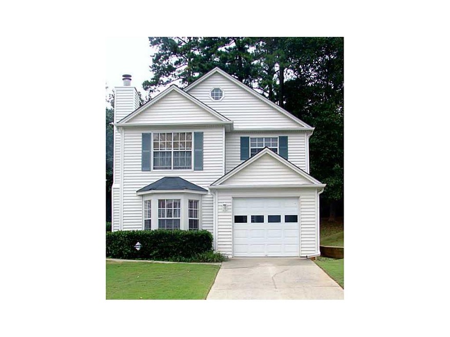 Exterior Front. Long driveway leads up to this qua