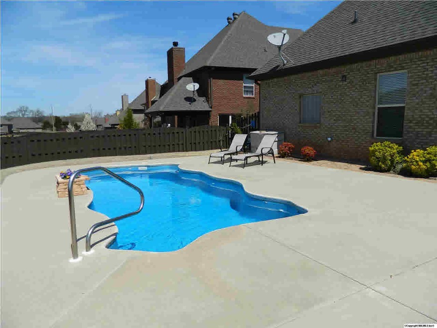 You will LOVE this Ocean Reef Marathon Fiberglass Saltwater pool with waterfall, steps, a deep end bench and Hayward colored logic light all installed in 2008.