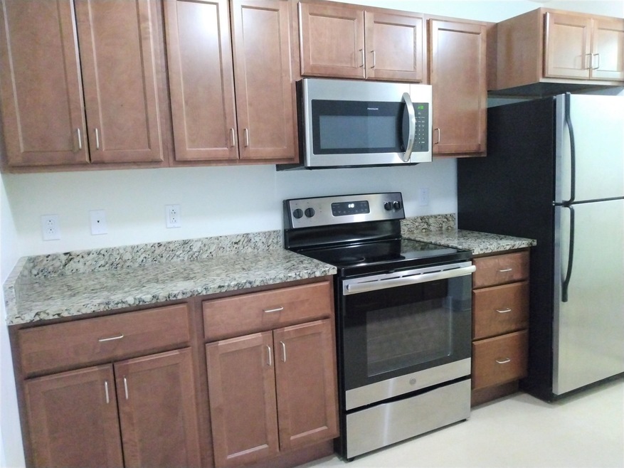 37 Hawthorne Dr unit 100, Bedford, NH 03110 - photo 1