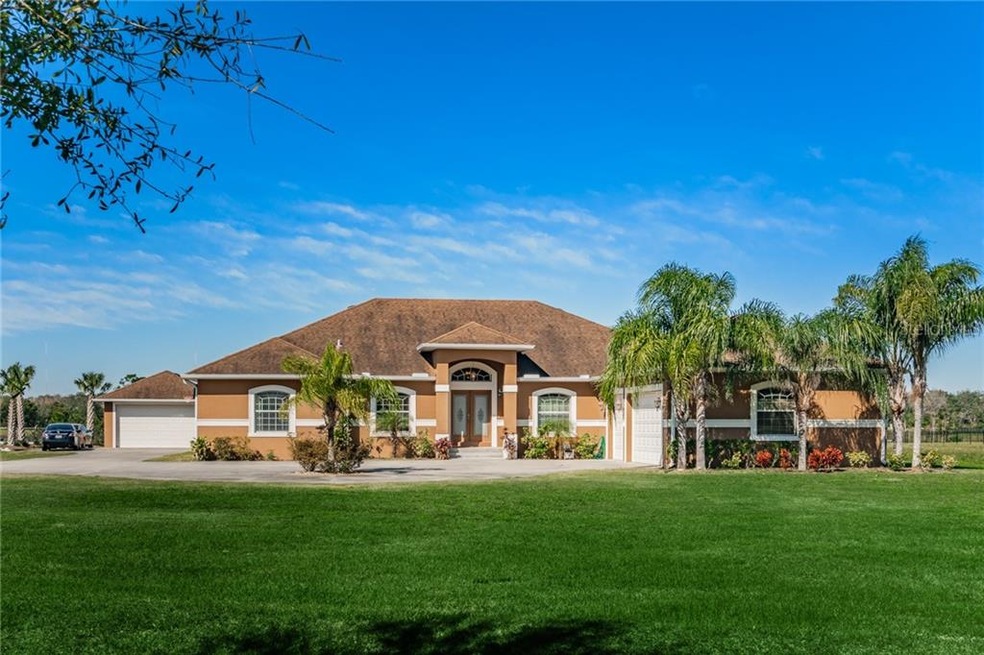 13020 McIntosh Lakes Ln, Dover, FL 33527 - photo 1