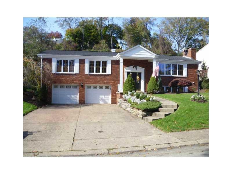 Exterior Front. Concrete Drive and Professionally 