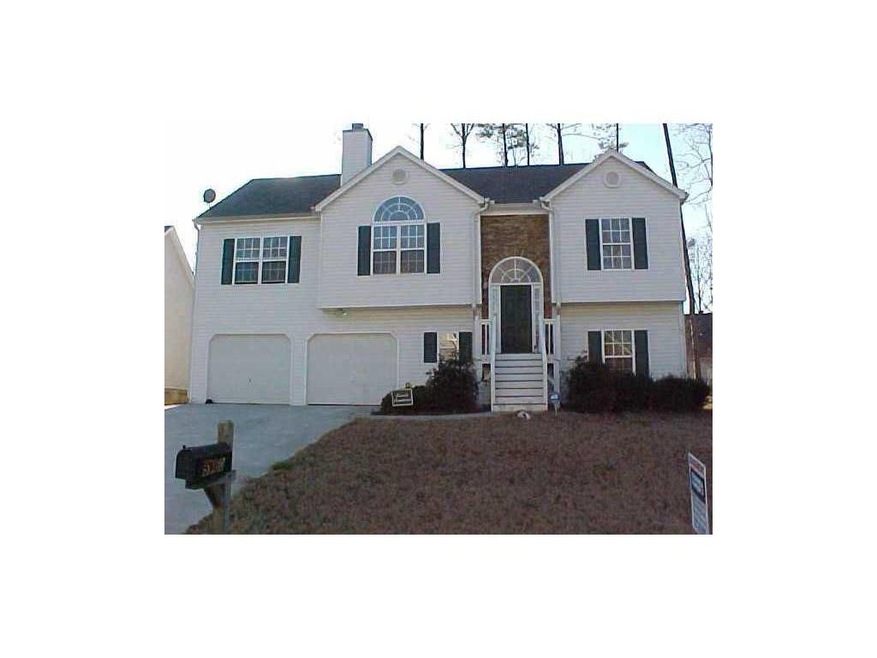 Exterior Front. Beautiful stone accent