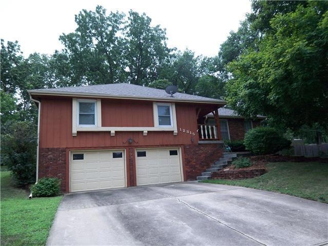 Raised Ranch in ideal location of Lenexa, KS.