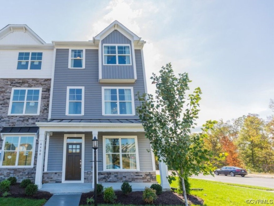 The Moseley is a three-story, three-bedroom, two f