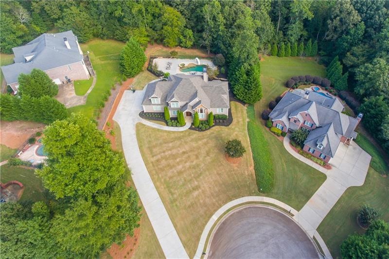 Aerial View of Stately Home with private yard and 