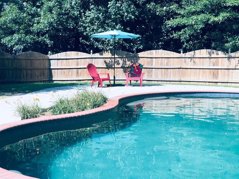 Backyard oasis featuring beautiful in ground pool