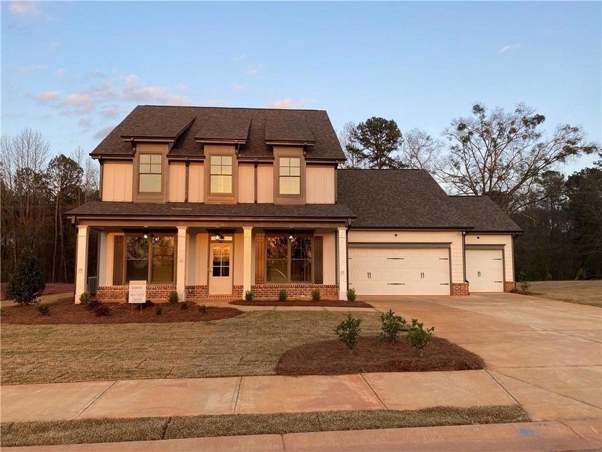 HUGE rocking chair front porch and 3 rd car garage