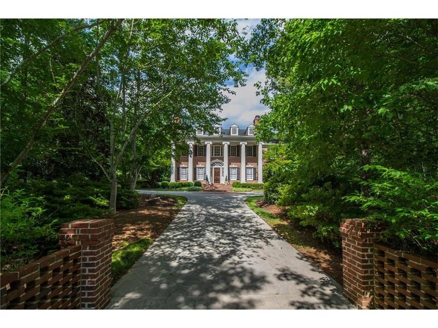 Welcome to 3722 Rock Ivy Trail in Old Ivy.  A gate