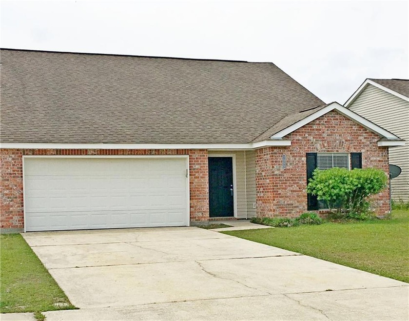 Front view of home. Very clean, easy landscaping.