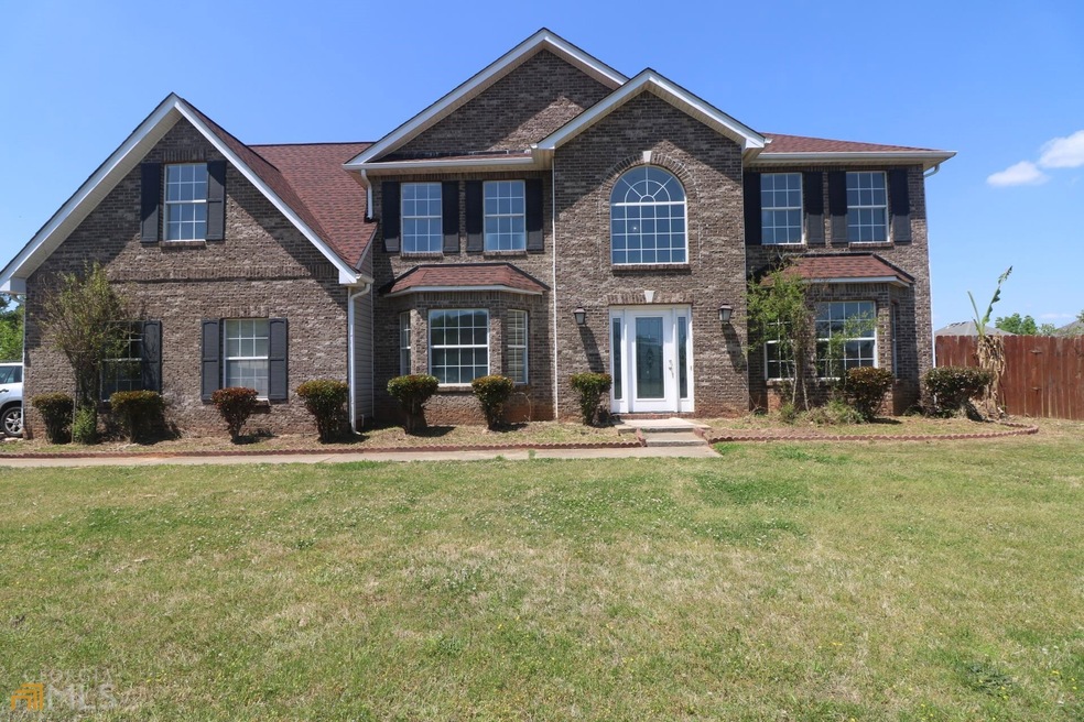 9464 Deer Crossing Ln, Jonesboro, GA 30236 - photo 1