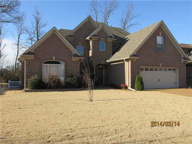 Lovely brick home on one acre lot.