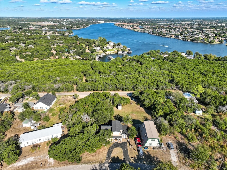 Aerial view of a large body of water and a forest