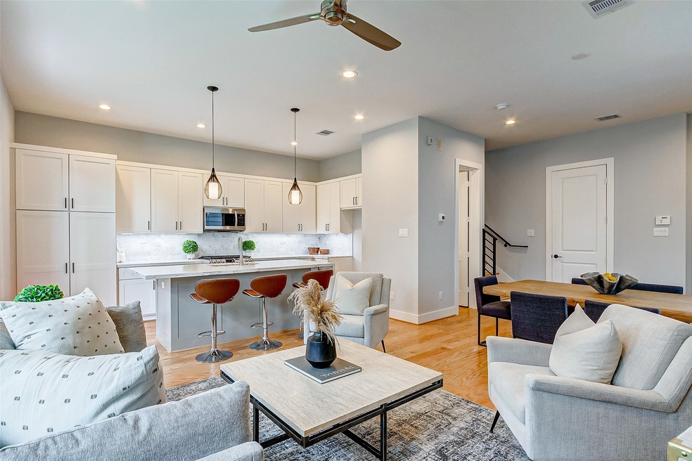 Kitchen view. Ample cabinet space and large pantry