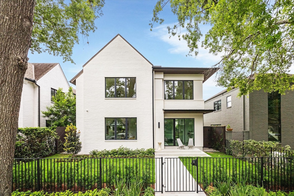 Welcome to 2215 Albans Rd—an elegant transitional-