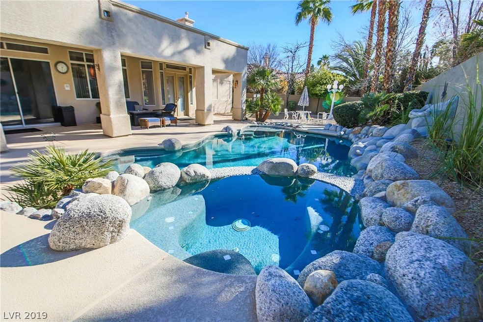 Custom Backyard oasis with heated pool and spa!