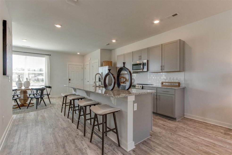 Open kitchen is fully loaded with all stainless st