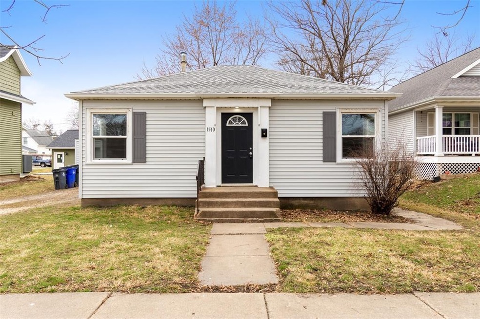 Siding, gutters, front door, and shutters are all 