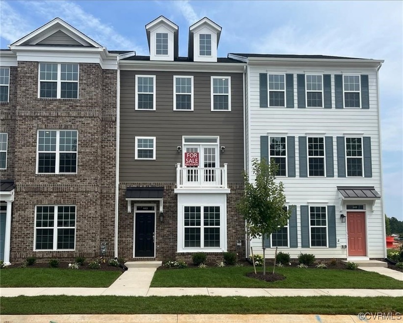 View of front of property with a front lawn