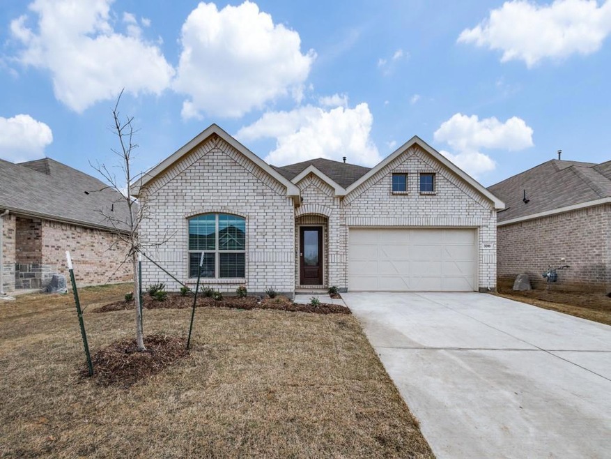 Lovely curb appeal with covered front porch.