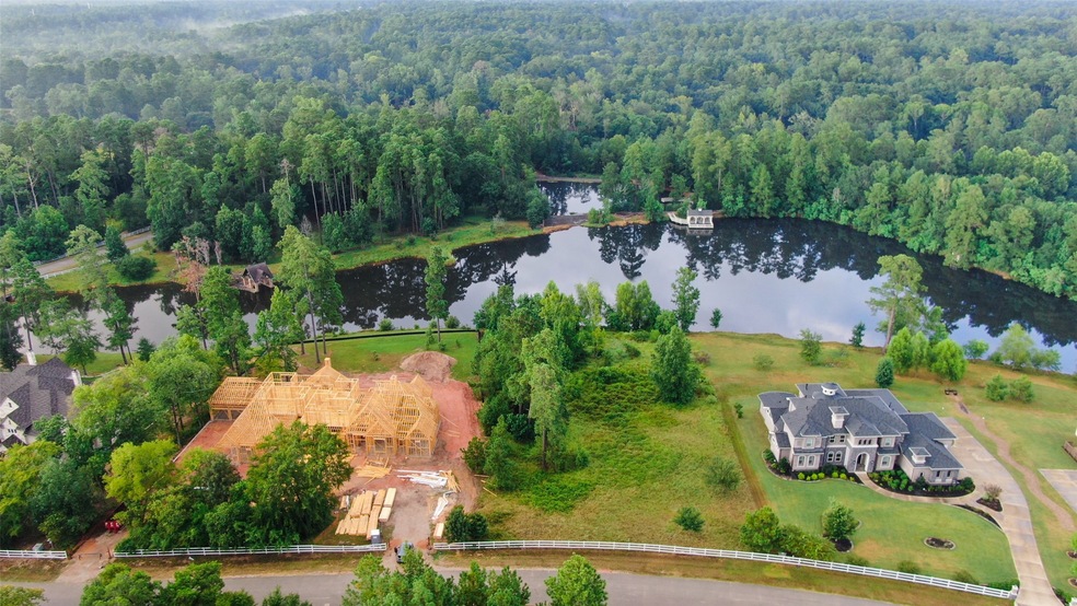 View of Lot 6 between its two neighboring properties and overlooking the lake.
