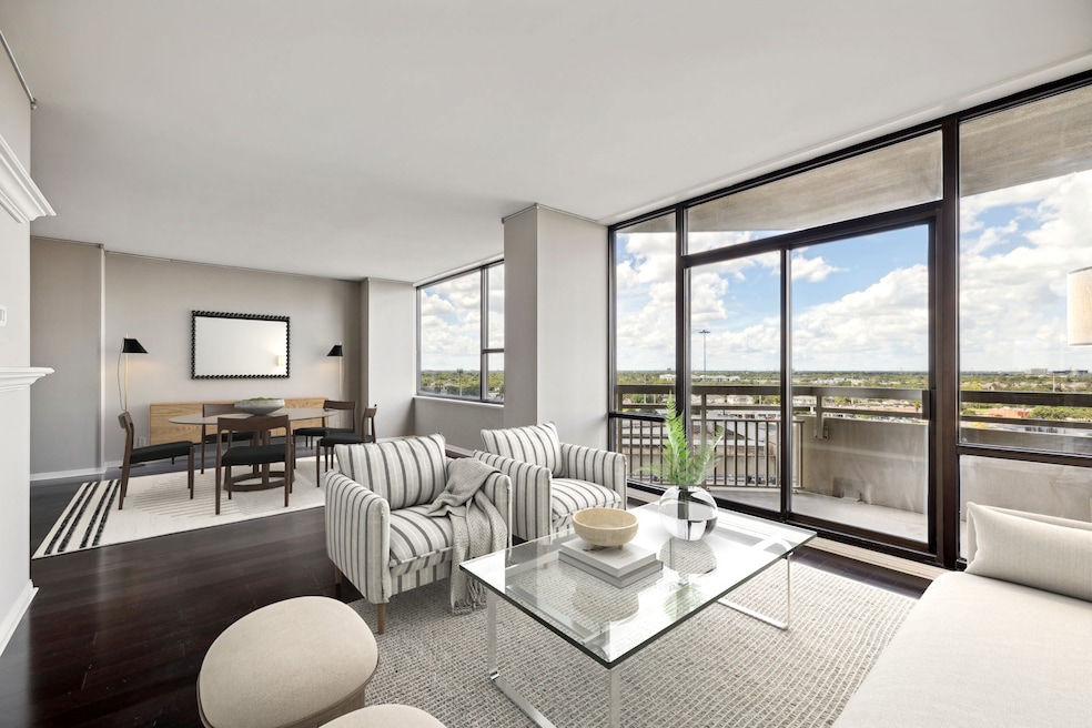 Engineered hardwood floors and a private balcony.
