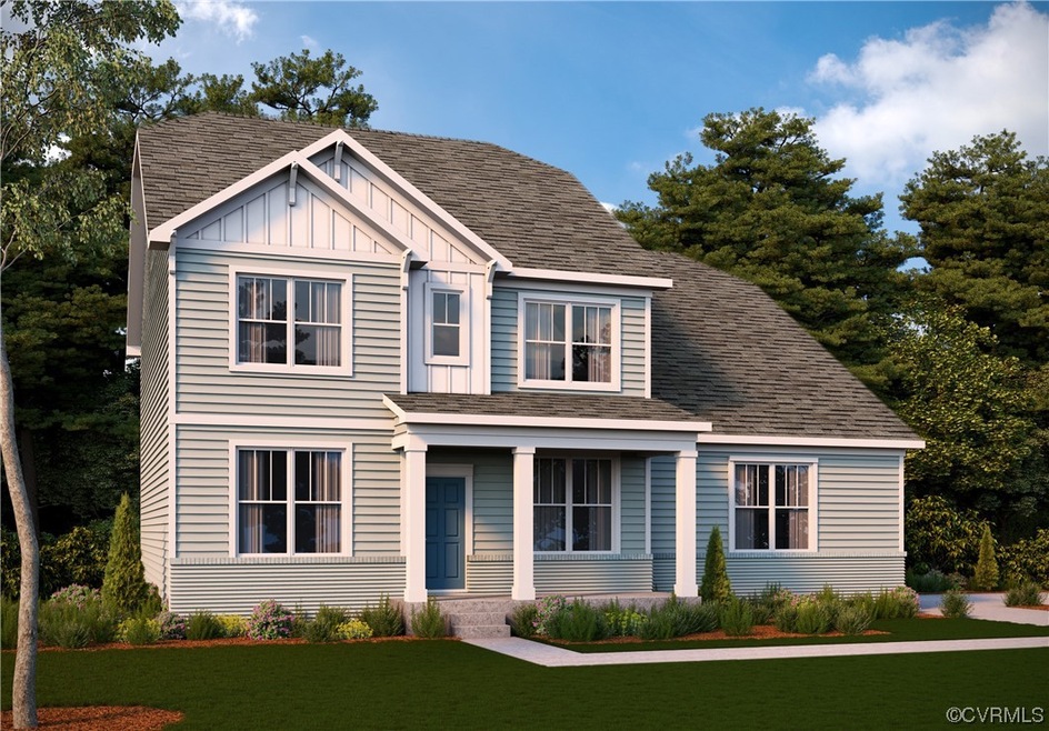 View of front facade featuring a front yard