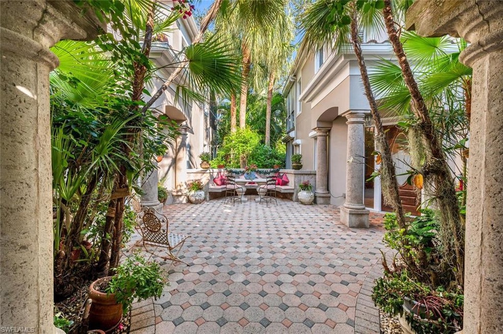 View of patio with an outdoor hangout area