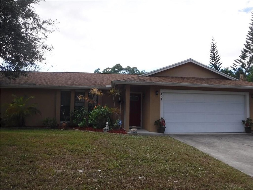 Front view. Nicely landscaped.