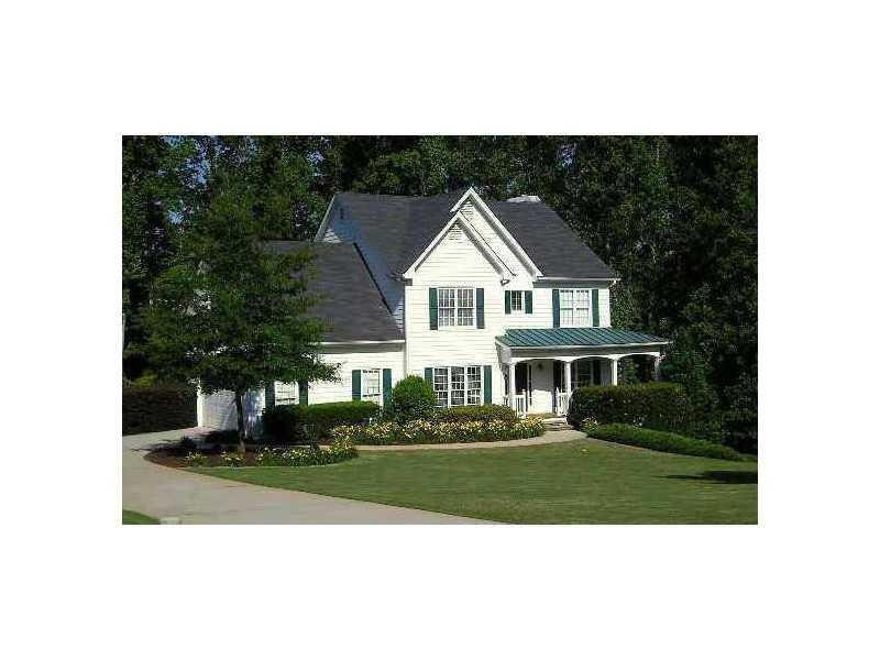 Exterior Front. Lovely Exterior with wooded lot an